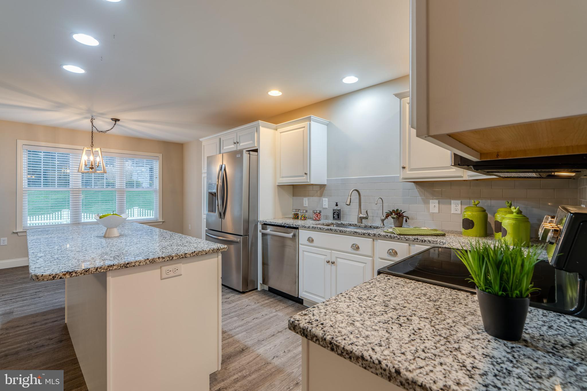 1400 Limestone Ridge Landisville, PA 17538 - Photo 19 of 50 a kitchen with stainless steel appliances granite countertop sink stove and refrigerator