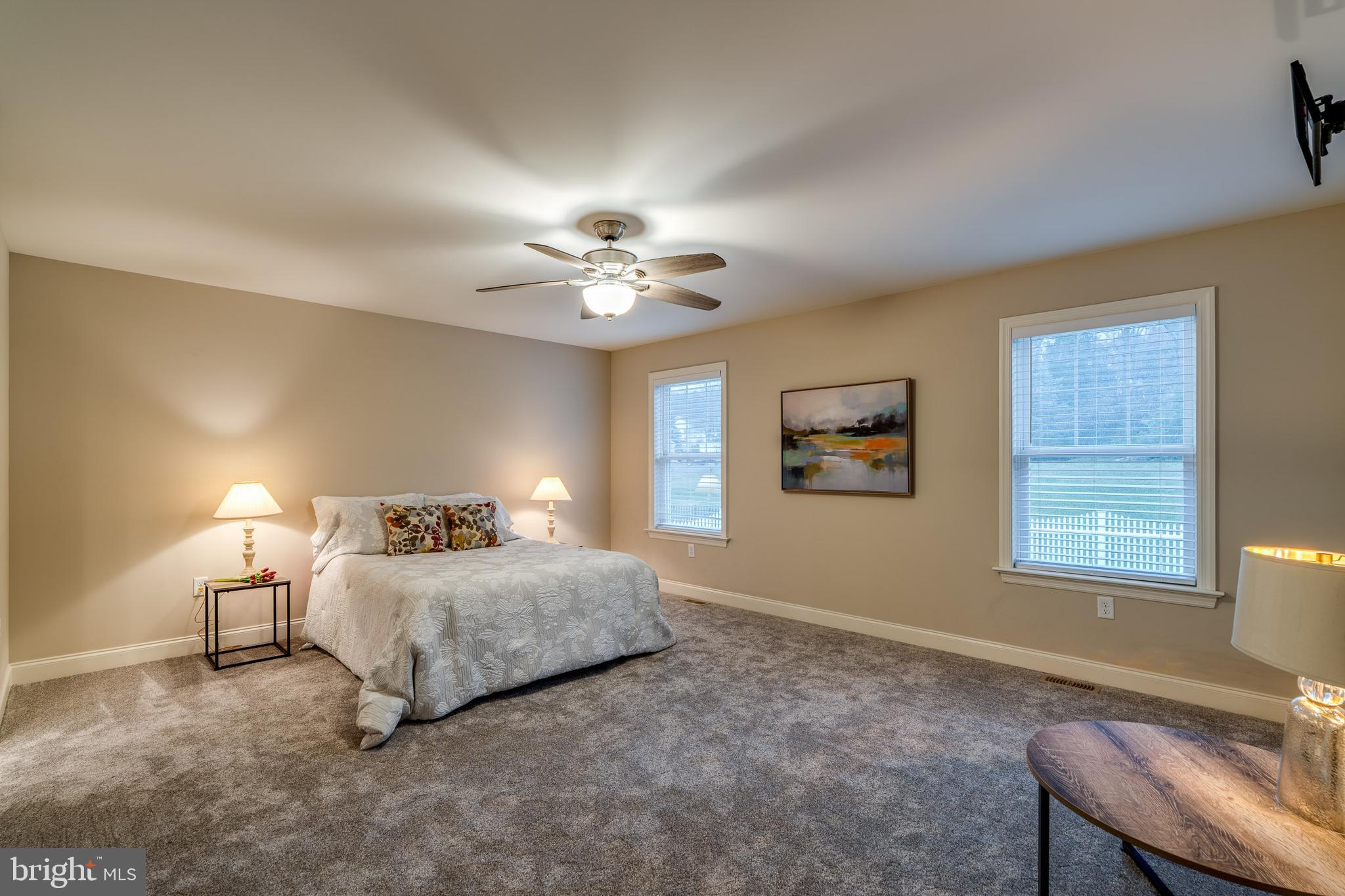 1400 Limestone Ridge Landisville, PA 17538 - Photo 23 of 50 a bedroom with a bed and a chandelier