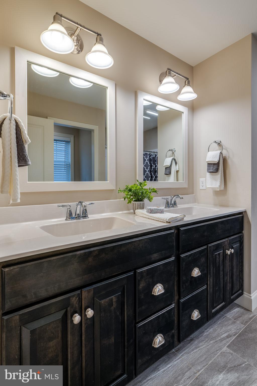 1400 Limestone Ridge Landisville, PA 17538 - Photo 29 of 50 a bathroom with a granite countertop sink and a mirror