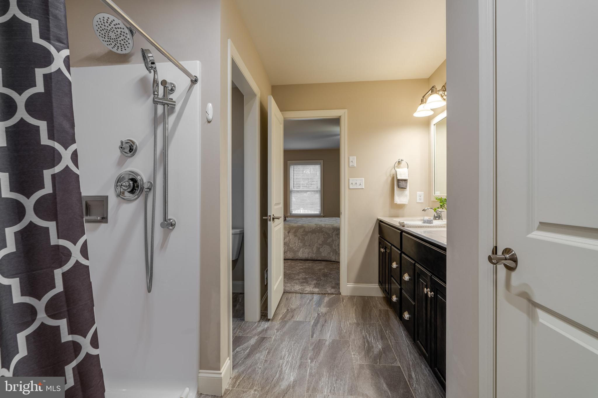 1400 Limestone Ridge Landisville, PA 17538 - Photo 30 of 50 a bathroom with a double vanity sink toilet and shower