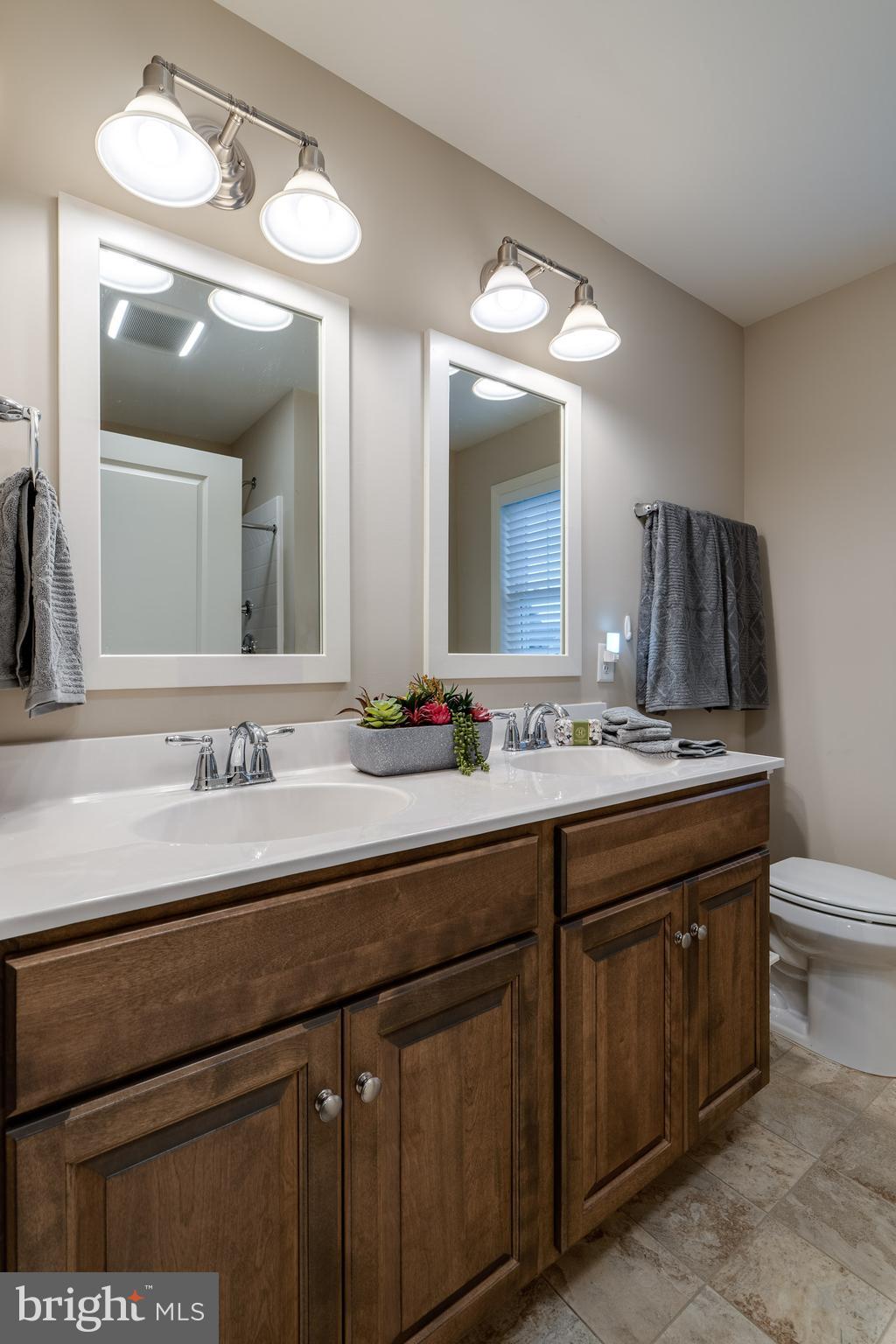 1400 Limestone Ridge Landisville, PA 17538 - Photo 38 of 50 a bathroom with a double vanity sink and a mirror