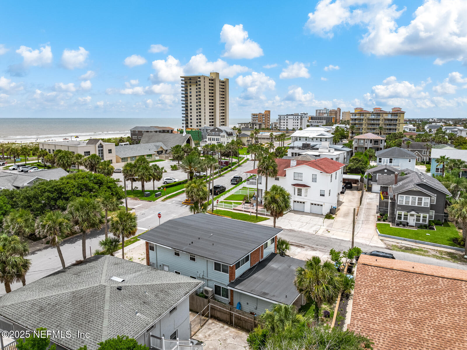 200 Hopkins Street Neptune Beach, FL 32266 - Photo 2 of 6 an aerial view of residential houses with outdoor space and ocean view