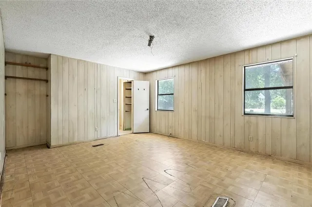 an empty room with windows