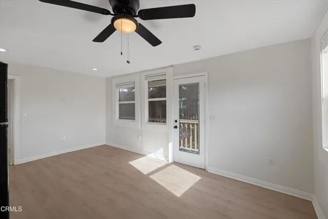 a kitchen with stainless steel appliances granite countertop a refrigerator sink and cabinets
