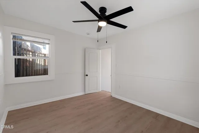 a view of a wooden fence