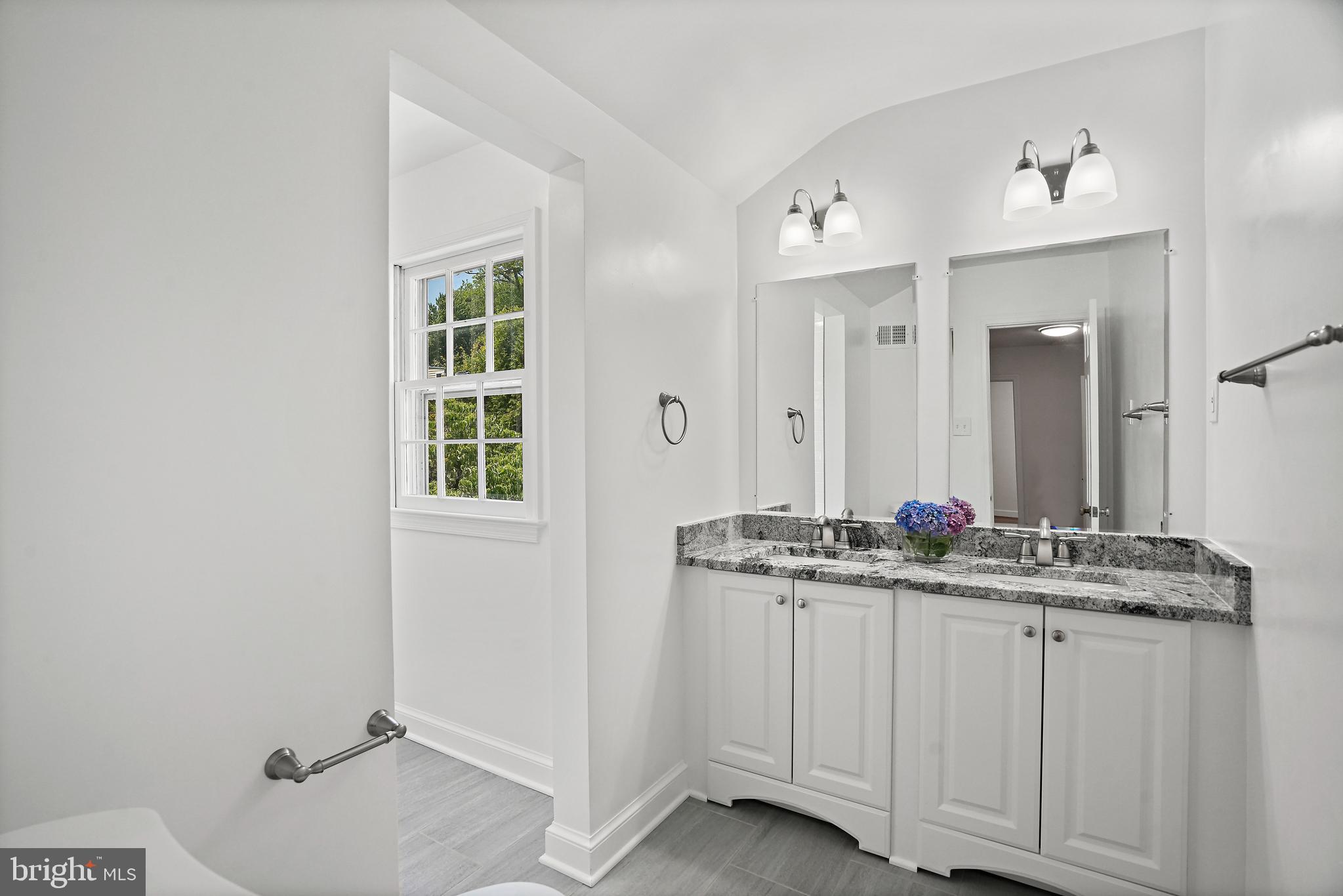 7206 Delfield Street Chevy Chase, MD 20815 - Photo 11 of 24 Full bath on second level with double vanity