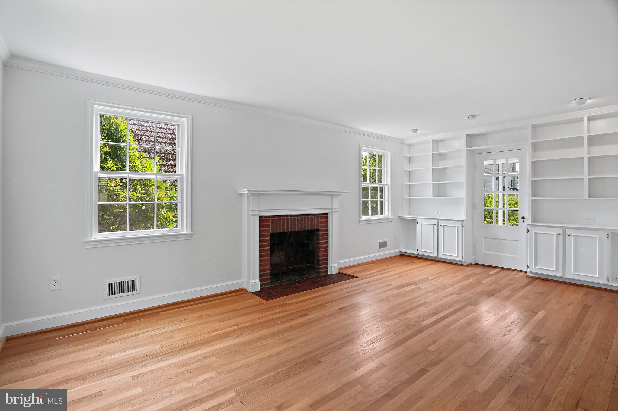 7206 Delfield Street Chevy Chase, MD 20815 - Photo 4 of 24 Living room with fireplace