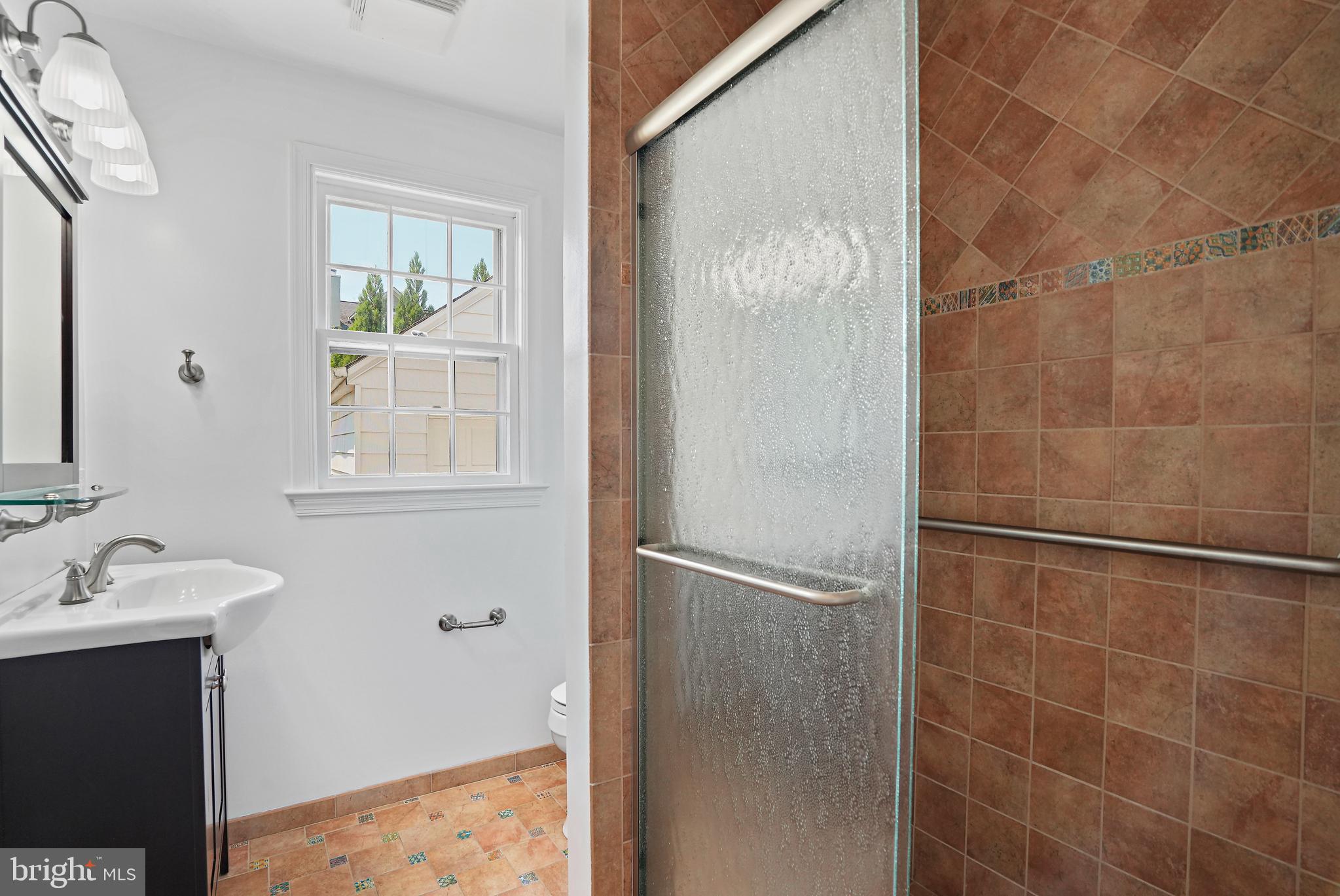 7206 Delfield Street Chevy Chase, MD 20815 - Photo 8 of 24 Full bath on main level