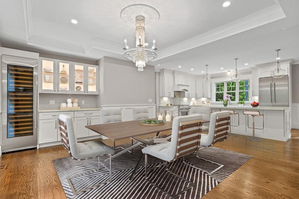 432 South Border Road Winchester, MA 01890 - Photo 11 of 40 a large kitchen with a table and chairs