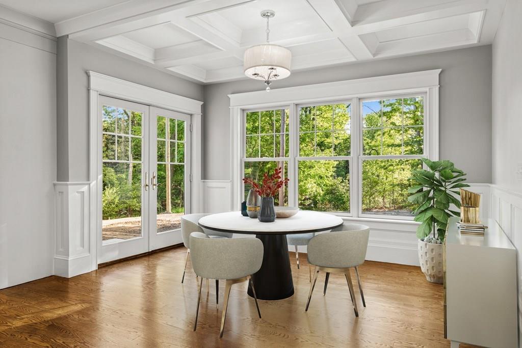 432 South Border Road Winchester, MA 01890 - Photo 15 of 40 a dining room with furniture window wooden floor