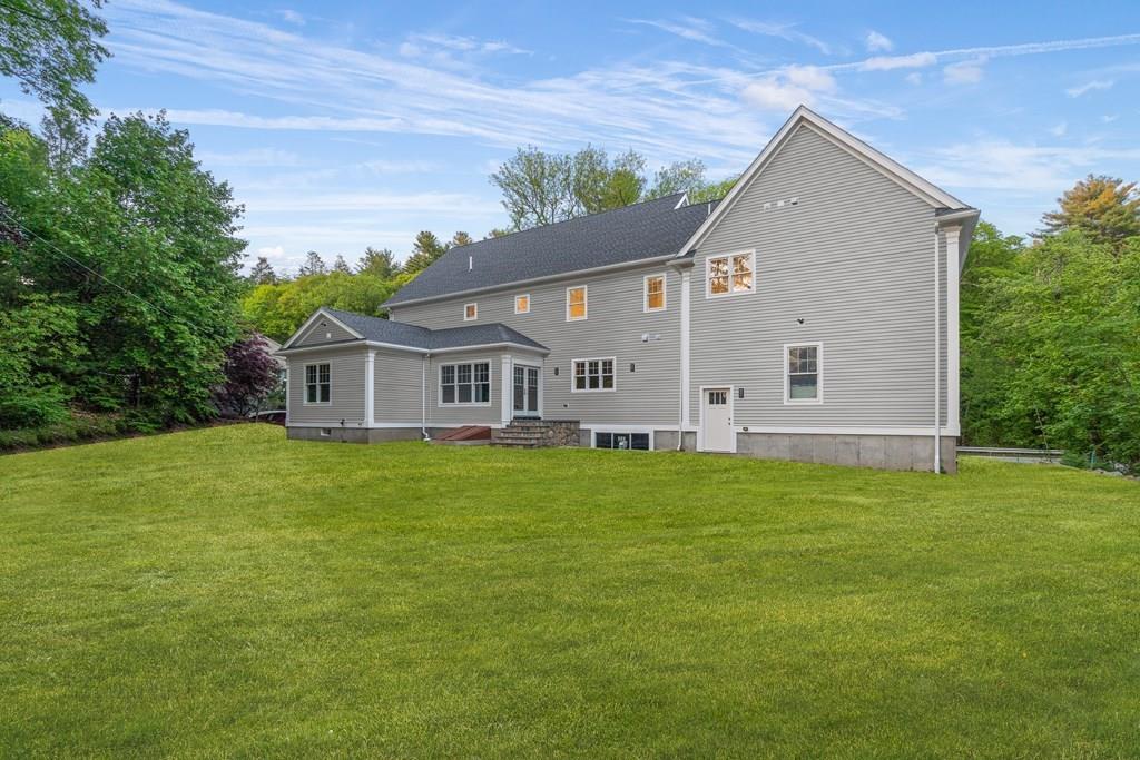 432 South Border Road Winchester, MA 01890 - Photo 3 of 40 a view of a house with a big yard