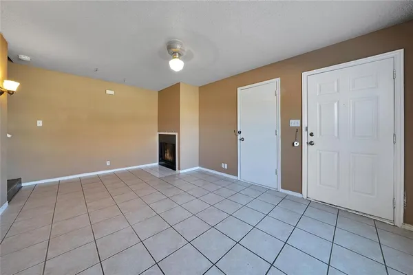 an empty room with natural light