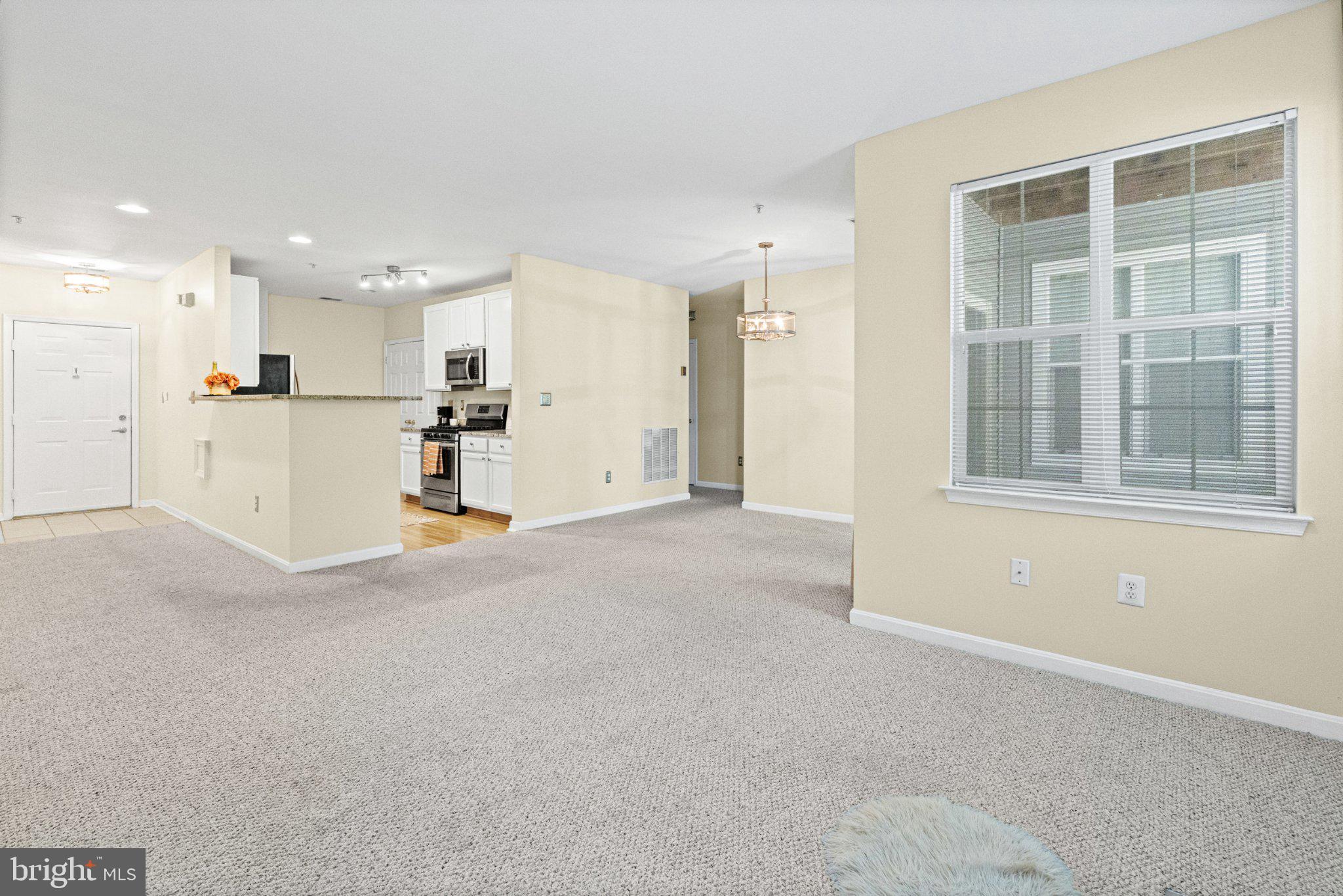 36 Hawk Rise Lane, Unit 104 Owings Mills, MD 21117 - Photo 22 of 25 Spacious, light-filled living area.