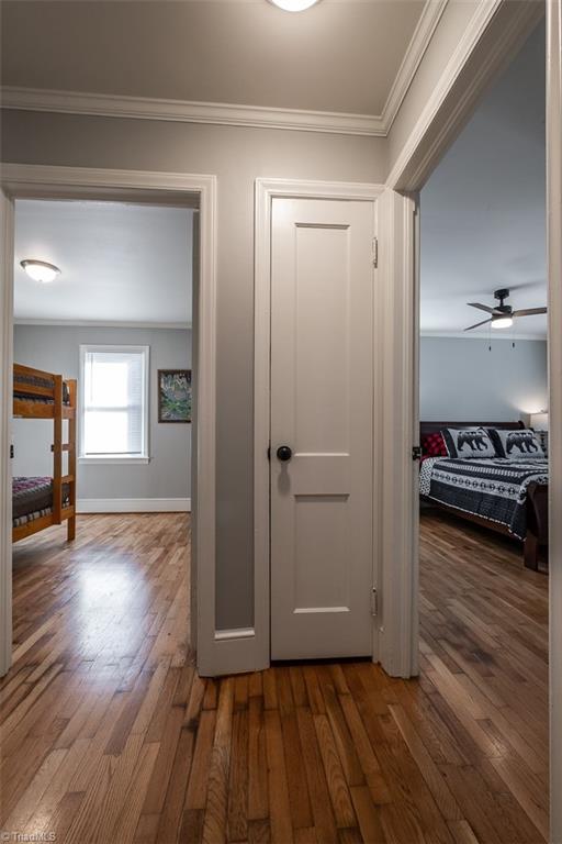 444 Elk Spur Street Elkin, NC 28621 - Photo 10 of 21 Hallway leading to three bedrooms and one bath.