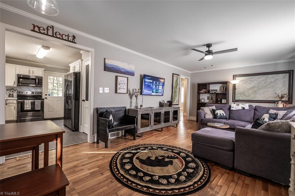 444 Elk Spur Street Elkin, NC 28621 - Photo 21 of 21 Open floor plan with refinished hardwood floors.