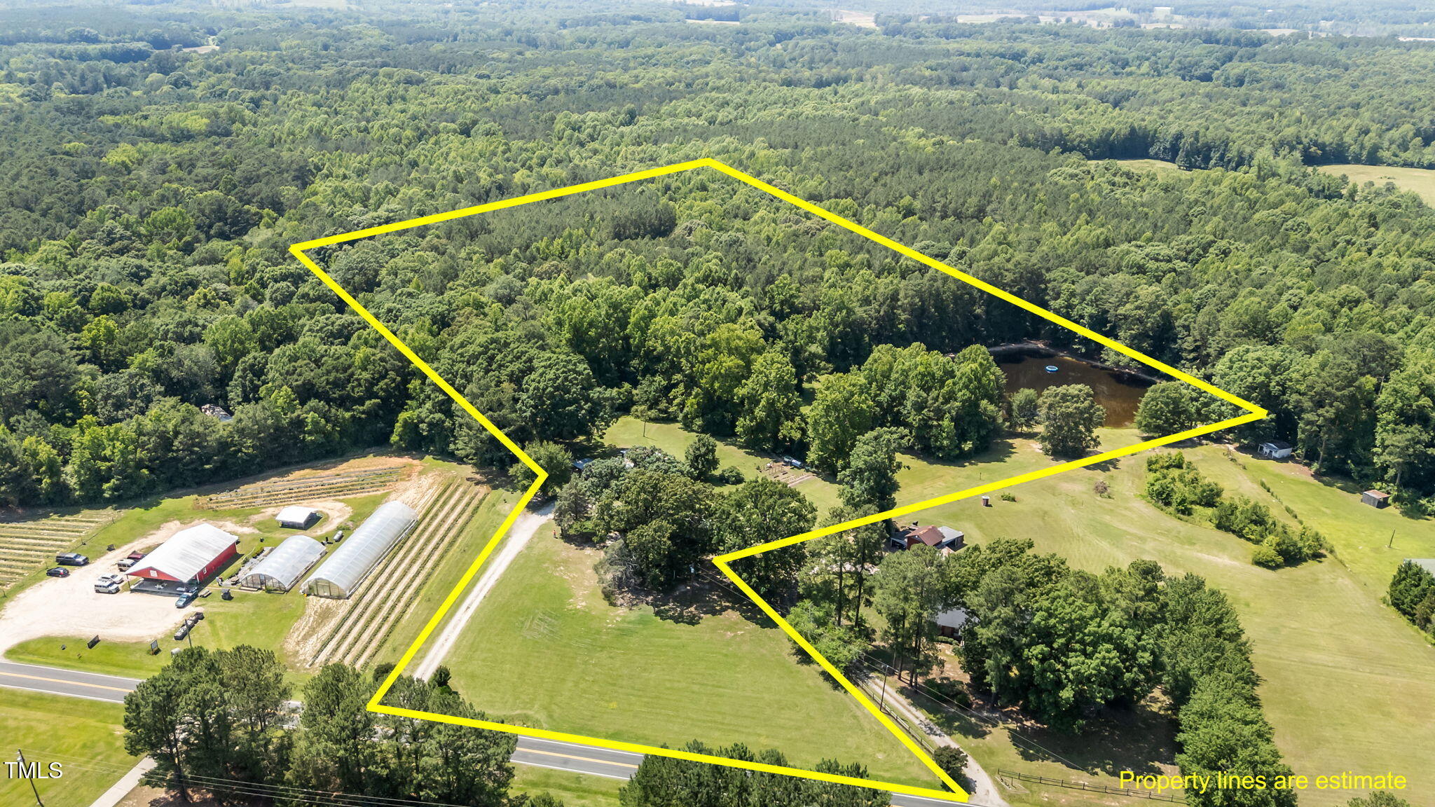 1355 Sykes Road Spring Hope, NC 27882 - Photo 1 of 39 39-web-or-mls-14-print-DJI_2025060314455