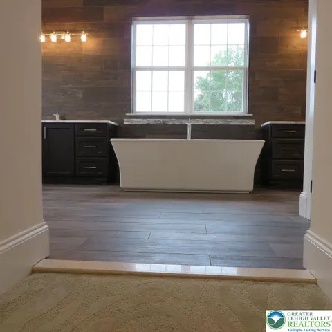 a view of a bathtub in a bathroom