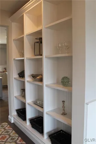 a room with a walk in closet and a window