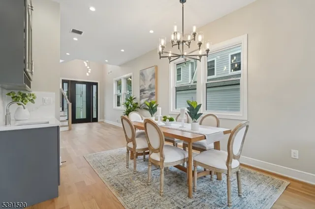 a spacious bedroom with a large bed and a window