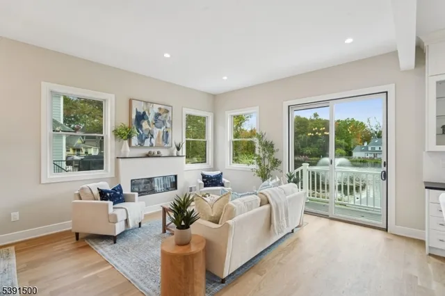 a bathroom with a shower a mirror and a sink