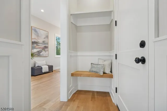 a bathroom with a sink toilet and mirror