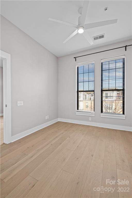 3279 Noda Boulevard Charlotte, NC 28205 - Photo 14 of 20 an empty room with windows and entrance