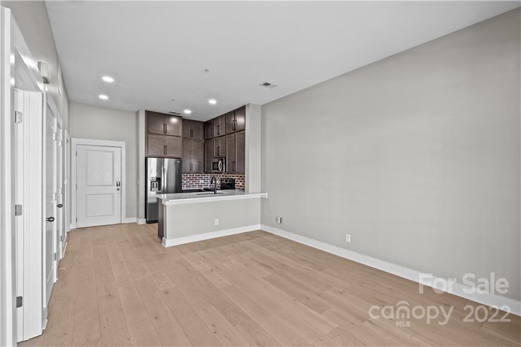 3279 Noda Boulevard Charlotte, NC 28205 - Photo 7 of 20 a view of kitchen with refrigerator and window