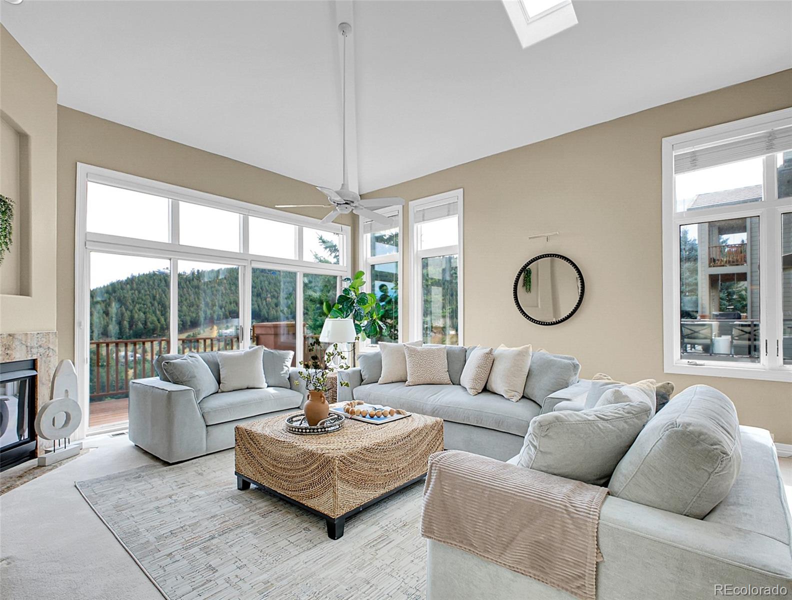 568 Ridgeside Drive Golden, CO 80401 - Photo 2 of 48 a living room with furniture and a large window