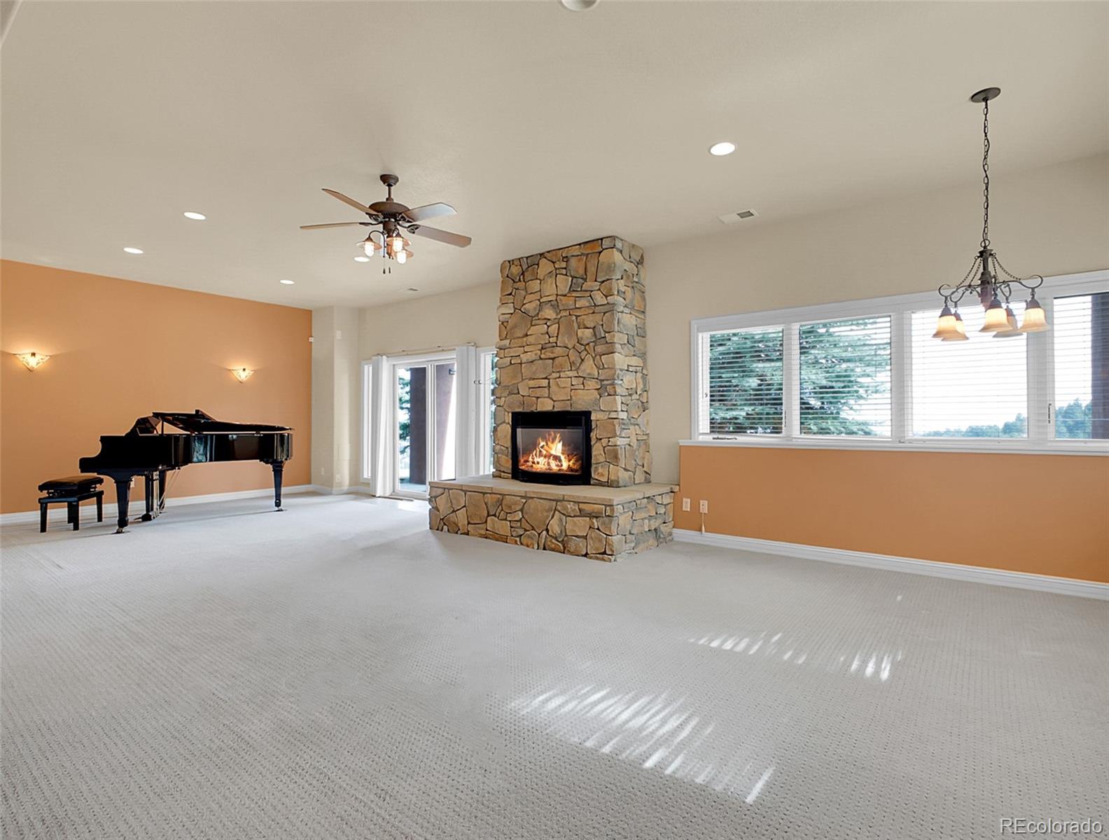 568 Ridgeside Drive Golden, CO 80401 - Photo 21 of 48 a living room with furniture fireplace and window
