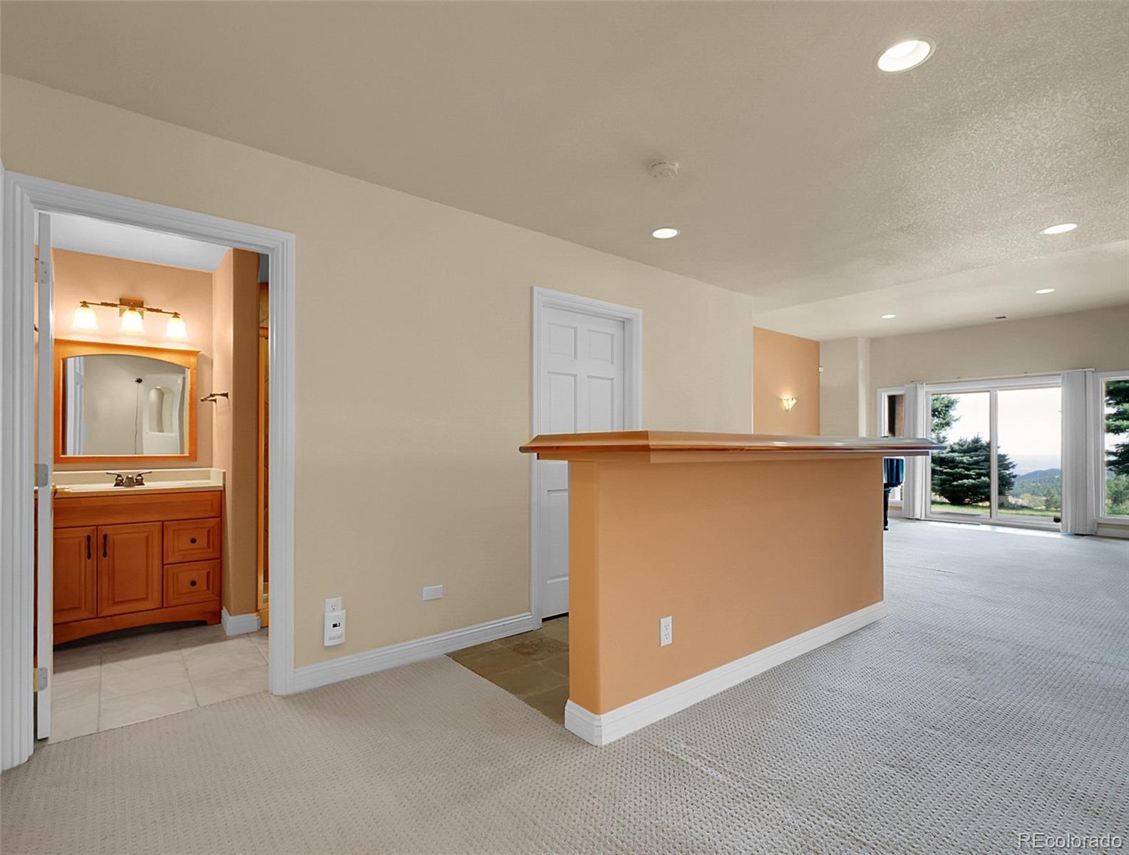 568 Ridgeside Drive Golden, CO 80401 - Photo 28 of 48 a view of a kitchen with a sink and cabinets
