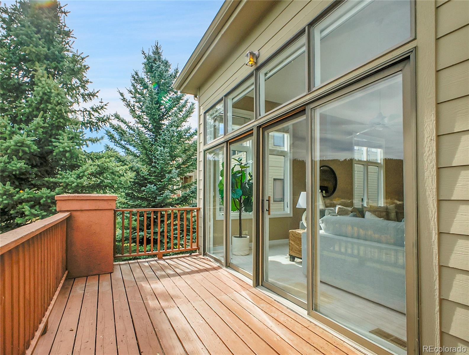 568 Ridgeside Drive Golden, CO 80401 - Photo 31 of 48 a view of a balcony with wooden floor