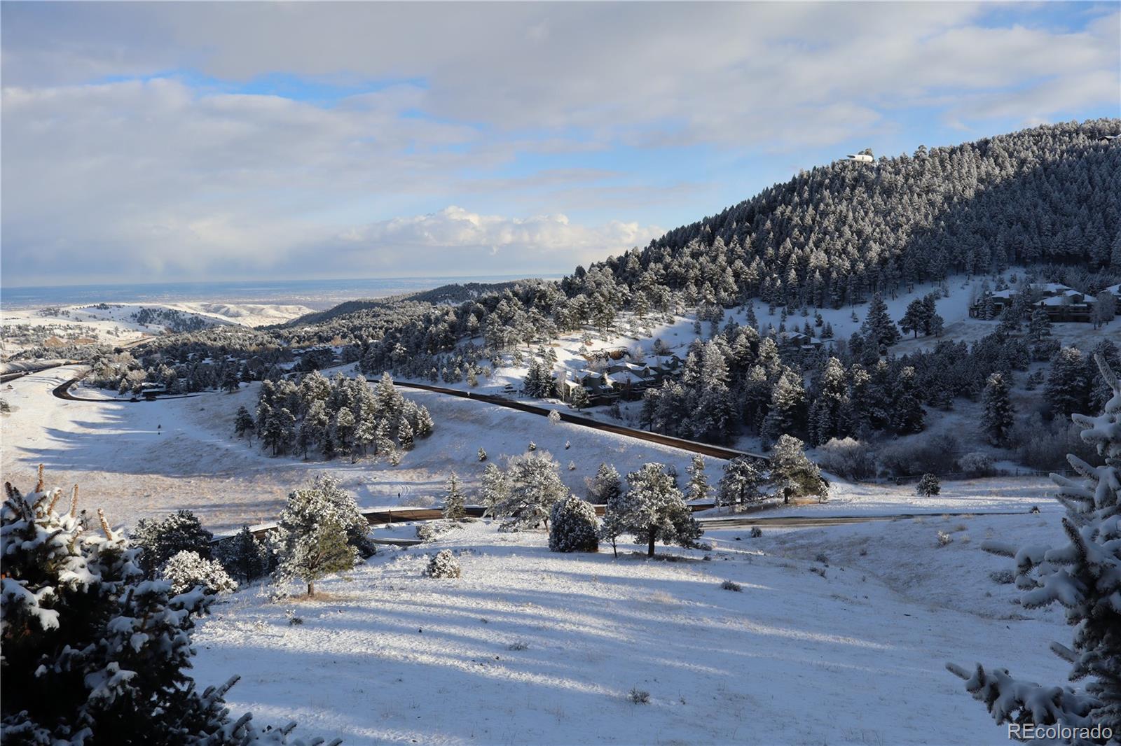 568 Ridgeside Drive Golden, CO 80401 - Photo 41 of 48 a view of a building with a mountain
