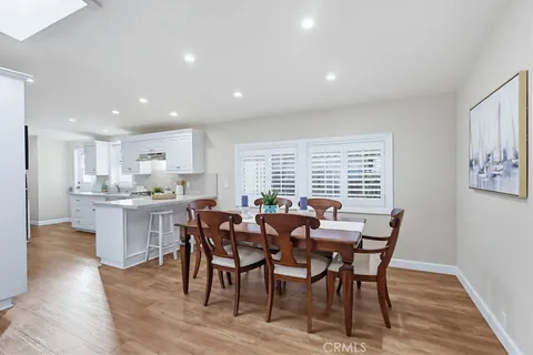 a spacious bedroom with a bed and a window