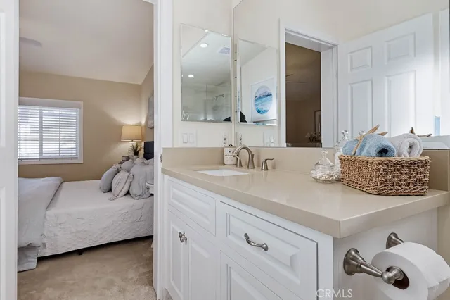 a work room with furniture and a window