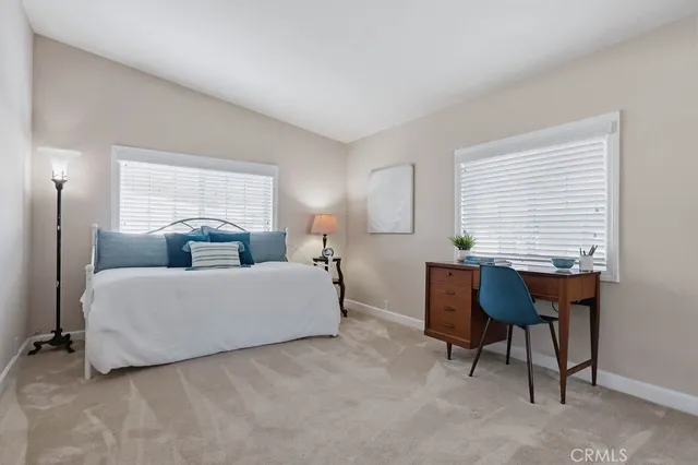 a view of entryway with a table and a chair