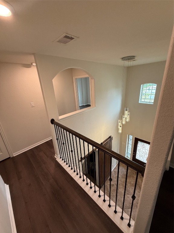 20206 Lago Bluff Loop Cypress, TX 77433 - Photo 13 of 16 a view of staircase with railing and a window
