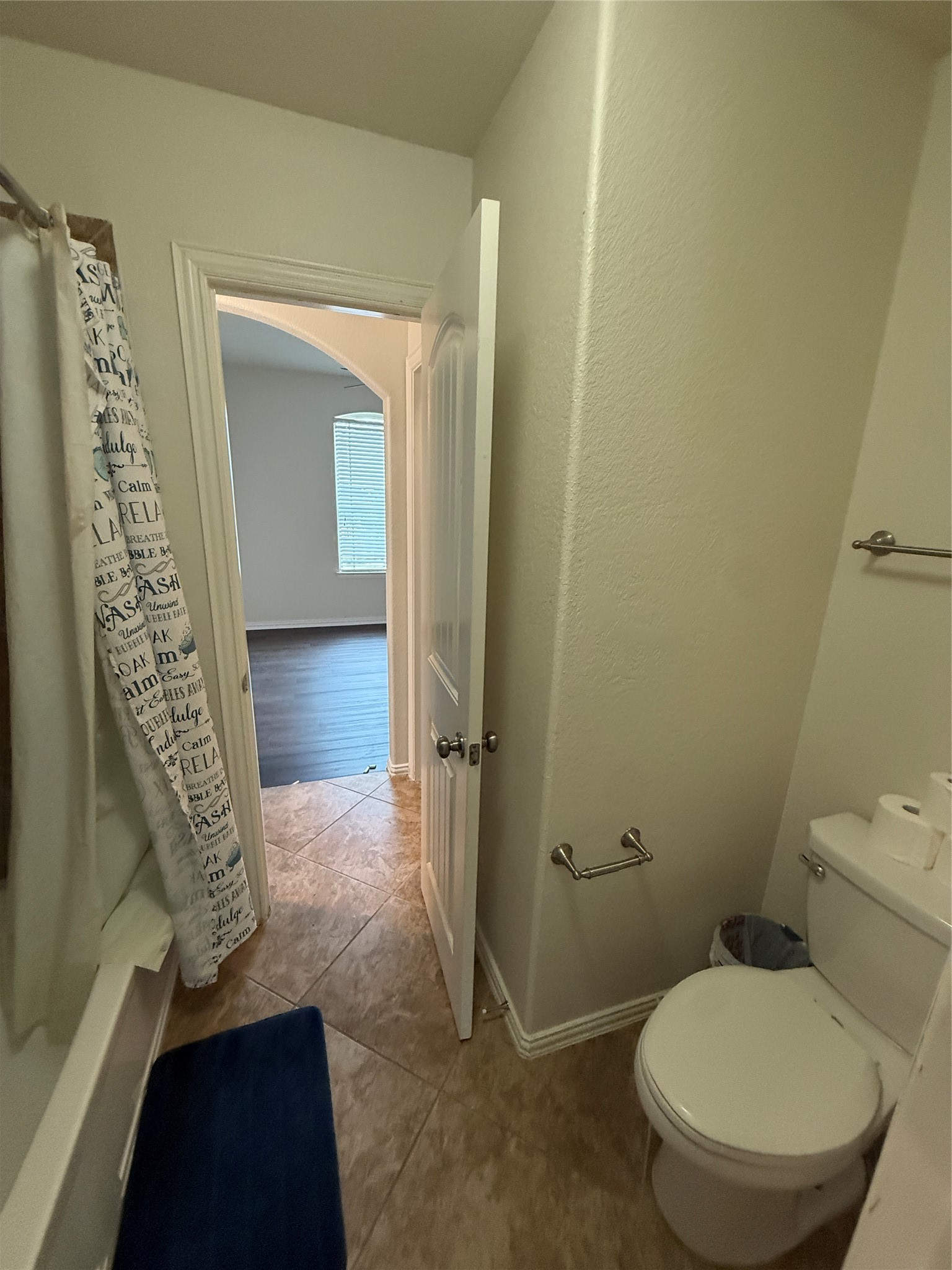 20206 Lago Bluff Loop Cypress, TX 77433 - Photo 14 of 16 a bathroom with a toilet and a shower