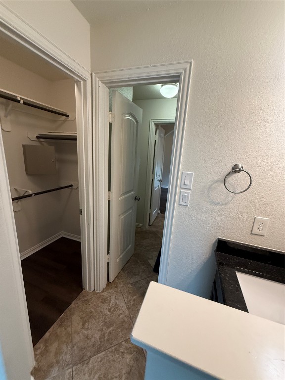 20206 Lago Bluff Loop Cypress, TX 77433 - Photo 15 of 16 a view of a hallway with wooden floor and staircase