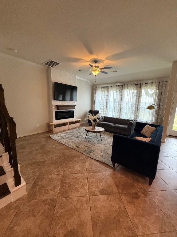 20206 Lago Bluff Loop Cypress, TX 77433 - Photo 3 of 16 a living room with furniture a flat screen tv and kitchen view
