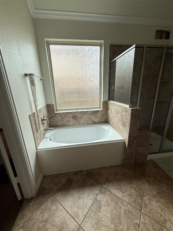 20206 Lago Bluff Loop Cypress, TX 77433 - Photo 7 of 16 a spacious bathroom with bathtub and shower