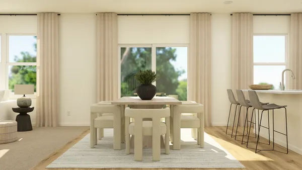 a view of kitchen island with furniture and wooden floor