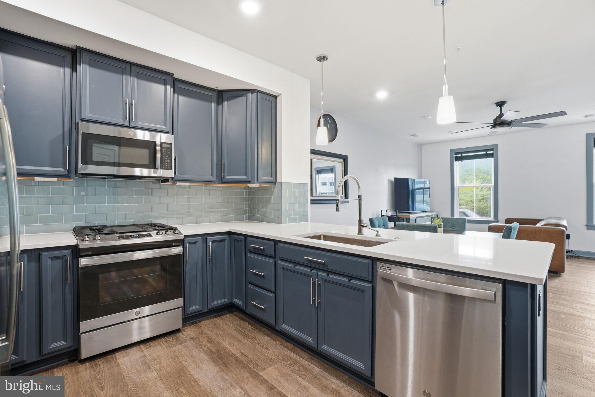 12916 Sunrise Ridge Alley, Unit 63 Herndon, VA 20171 - Photo 11 of 71 Modern kitchen with sleek design.