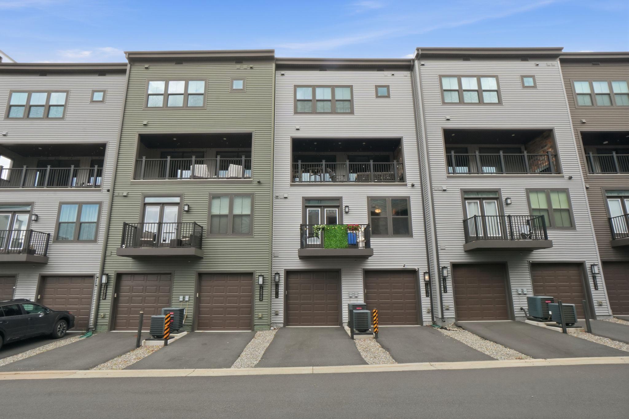 12916 Sunrise Ridge Alley, Unit 63 Herndon, VA 20171 - Photo 2 of 71 One car garage with extra parking