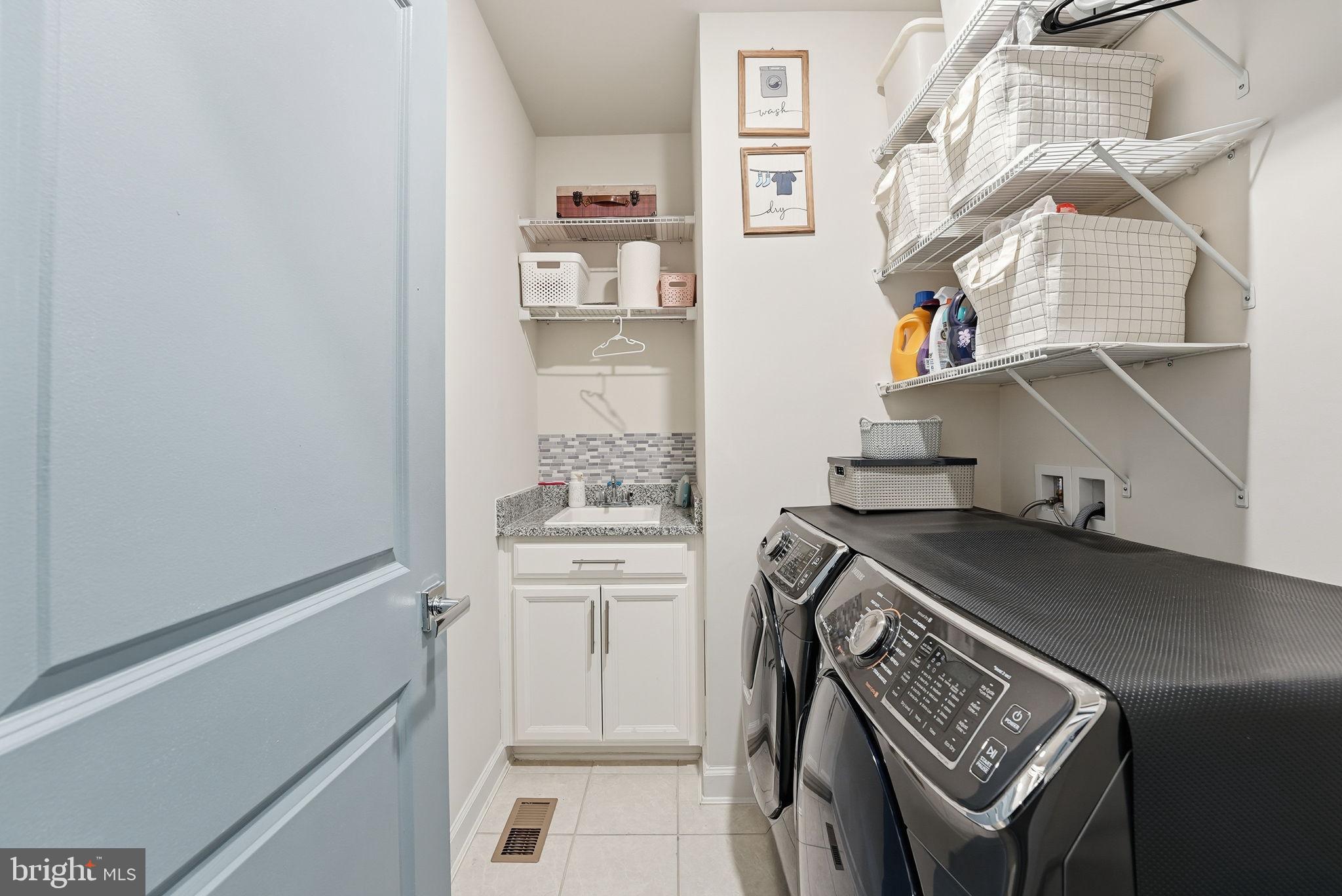 12916 Sunrise Ridge Alley, Unit 63 Herndon, VA 20171 - Photo 27 of 39 Large laundry room