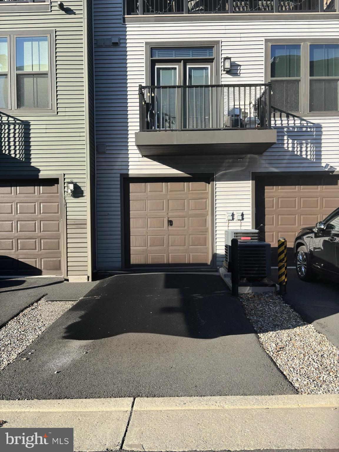 12916 Sunrise Ridge Alley, Unit 63 Herndon, VA 20171 - Photo 3 of 39 Single garage with inside entrance.