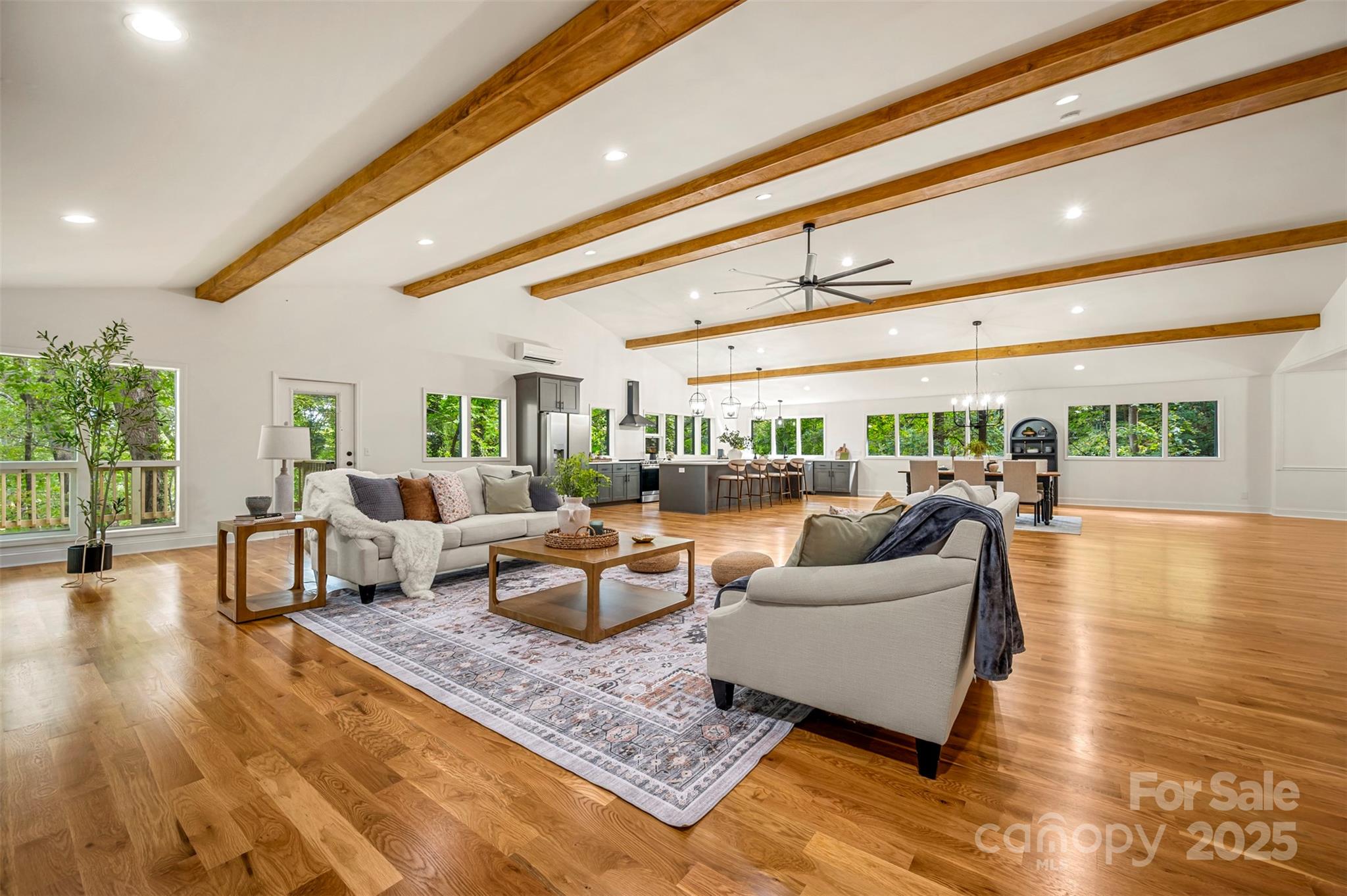 160 Lasae Lane Tryon, NC 28782 - Photo 12 of 48 a living room with furniture and a large window