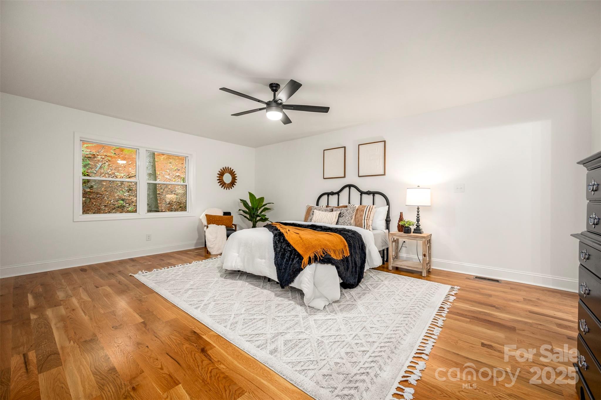 160 Lasae Lane Tryon, NC 28782 - Photo 26 of 48 a bedroom with a bed and window