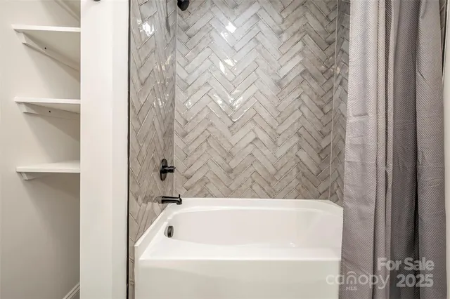 a bathroom with a bathtub