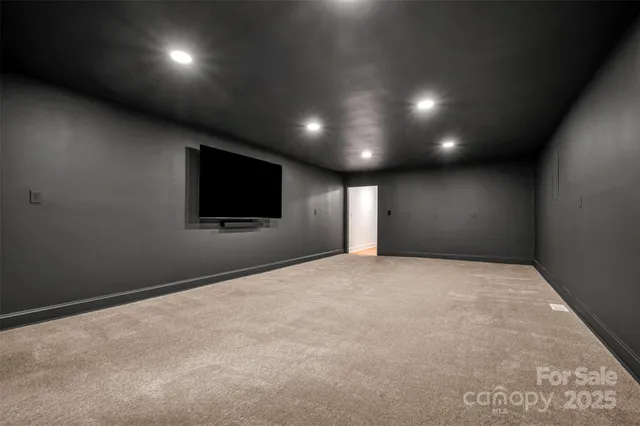 a view of an empty room with a tv