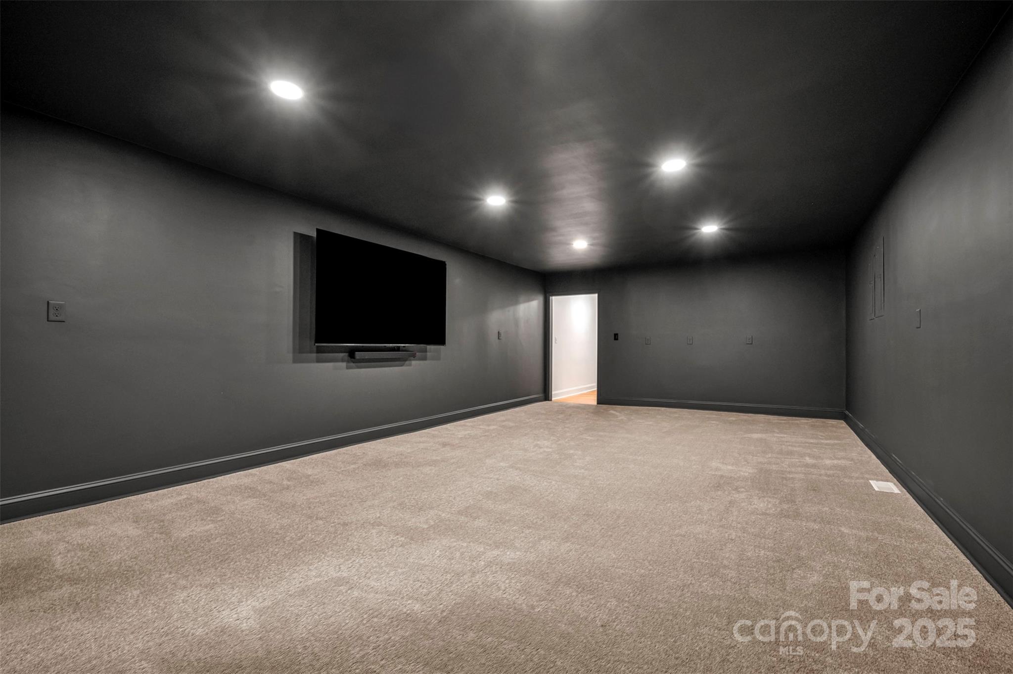 160 Lasae Lane Tryon, NC 28782 - Photo 36 of 48 a view of an empty room with a tv